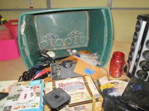 Non-covered storage tote filled wit...