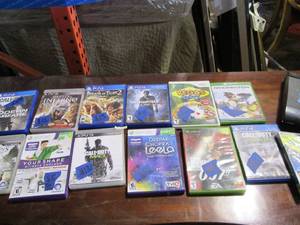 PS3 system with games, as pictured