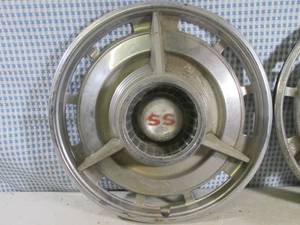 lot 50 image: (CS) Pair of Vintage SS Hub Caps Hu...