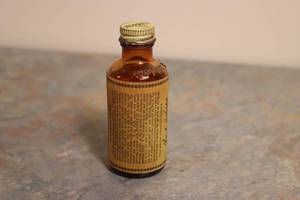 lot 24 image: Hoppes Bottle