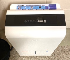 lot 73 image: Pelonis Dehumidifier with Manual