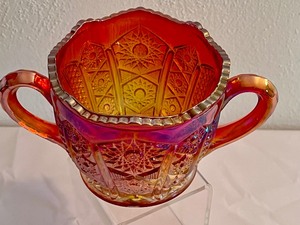 lot 45 image: Vintage Indiana Sunrise Carnival Glass Two Handled Creamer