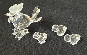 lot 340 image: Swarovski Chicken and Three Baby Chics