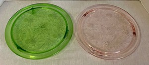 lot 177 image: Two Depression Era Cake Plates w Embossed Sunflowers