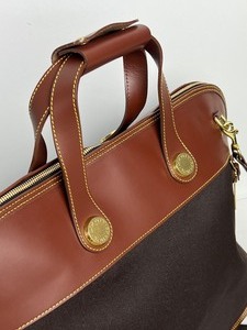 lot 5 image: Dooney and Bourke Overnight Travel Bag