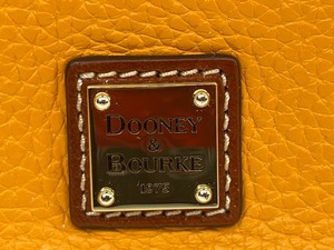 lot 11 image: Dooney and Bourke Pebble Grain Framed Coin Purse