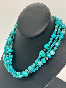 lot 23 image: Triple Strand Sterling and Turquoise Necklace