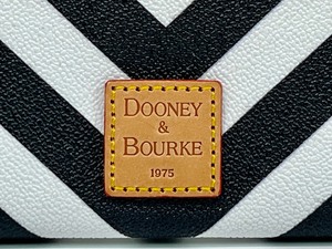 lot 31 image: Dooney and Bourke Zig Zag Pouch