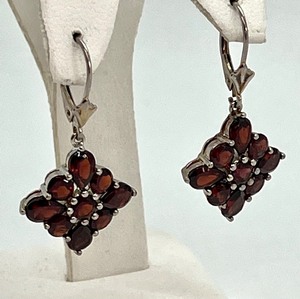 lot 105 image: Pair of Sterling and Garnet Earrings
