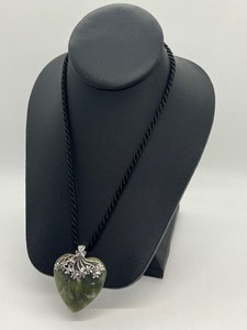 lot 55 image: Lovely Jade and Sterling Heart Shaped Pendant