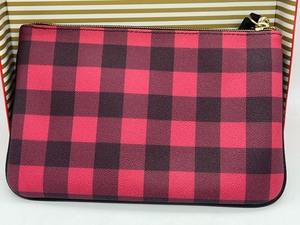 lot 66 image: Dooney and Bourke Carrington Pouch w Tassle