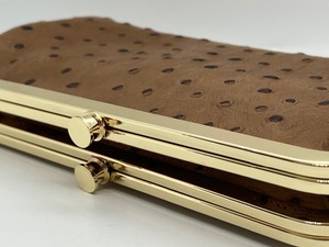 lot 88 image: G.I.L.I Leather Clutch