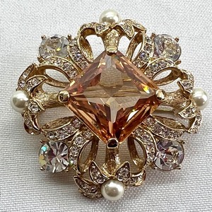 lot 93 image: Dazzling Nolan Miller Brooch