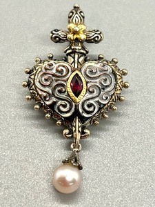 lot 134 image: Barbara Bixby 18k, Sterling, Garnet and Pearl Pendant