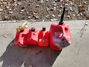 lot 61 image: (4) Gas Cans