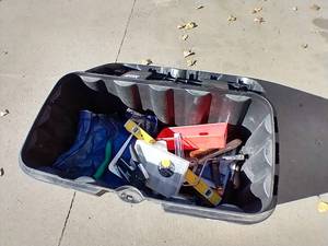 lot 128 image: Large Rubbermaid Tote & Tools