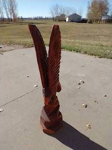 lot 146 image: Tall Carved Wooden Eagle