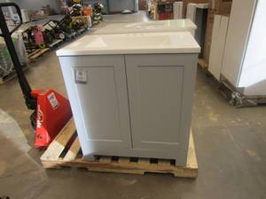 lot 17 image: GLACIER BAY 30.25 in. W x 18.75 in. D Bath Vanity in Pearl Gray with Cultured Marble Vanity Top in White with White Basin (SMALL CORNER DAMAGE ON TOP CORNER OF CABINET)