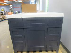 lot 24 image: HOME DECORATORS COLLECTION Rosedale 42 in. W x 19 in. D Bathroom Vanity in Blue with Cultured Marble Vanity Top in White with White Sink (CRACKED TOP, CHIPS ON BOTTOM OF VANITY)