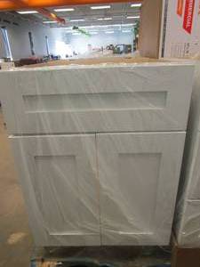 lot 28 image: HOME DECORATORS COLLECTION Newport Assembled 24 x 34.5 x 21 in. Plywood Shaker Vanity Sink Base Cabinet Soft Close in Painted Pacific White (LIKE NEW CONDITION)