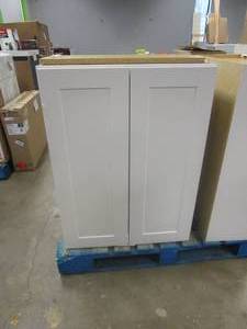lot 35 image: HAMPTON BAY Shaker Satin White Stock Assembled Wall Kitchen Cabinet (27 in. x 36 in. x 12 in.) (CHIP ON FRONT OF DOOR)