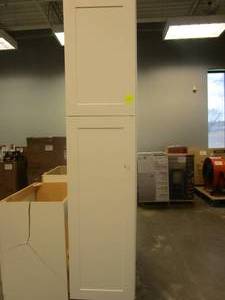 lot 170 image: HAMPTON BAY Hampton Satin White Raised Panel Stock Assembled Pantry Kitchen Cabinet (18 in. x 84 in. x 24 in.) (SEE PHOTOS, DAMAGED IN SEVERAL PLACES)