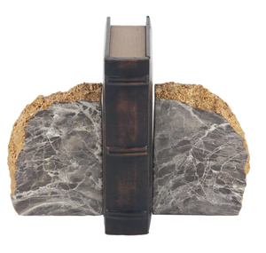 lot 149 image: COSMOLIVING Gray Polystone Glam Nature Bookends 7 in. x 5 in. (Set of 2) (NEW IN BOX)