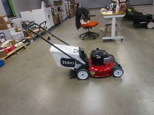 lot 191 image: TORO 21352 Recycler 21 in. Briggs and Stratton Low Wheel RWD Gas Walk Behind Self Propelled Lawn Mower with Bagger (RUNS, NICE CONDITION)