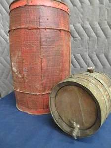SMALL WHISKEY BARREL AND LARGER OPEN BARREL