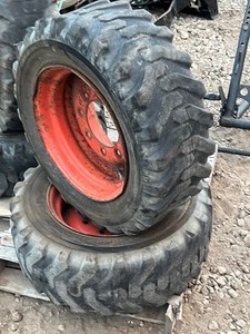 lot 5-C image: Set Of (4) Solideal Gripper 1016.5 Skid Loader Wheels & Tires