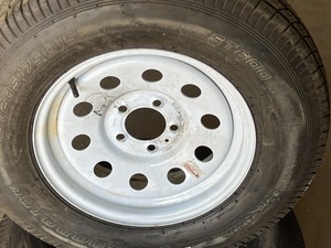 lot 36 image: (2) Like New 5-Lug Steel Trailer Wheels With Like New ST205  75  D15 Tires