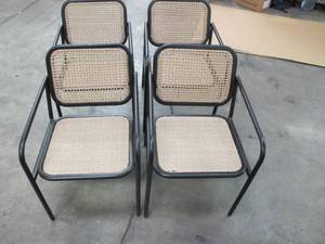 lot 325 image: Four Pack of Modern Dining Chairs - Black Metal with Tan Wicker Mesh