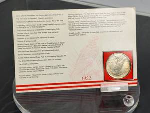 1922 U.S. Silver Peace Dollar in Excellent Condition with Stamp
