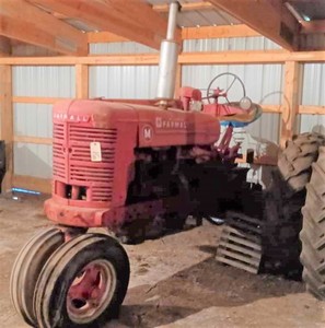 lot 16 image: Farmall M, NF, Serial No. FBK-114658, Has been in storage for more than a decade, not running)