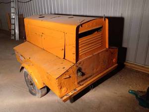 lot 23 image: Onan125 Two Wheel, 3-Phase Industrial Portable Generator, Model 10CW 4R1FZ