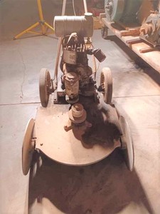 lot 69 image: Vintage Walk-Behind Lawn Mower with Metal Disc Wheels in Front, Serial No. 695649