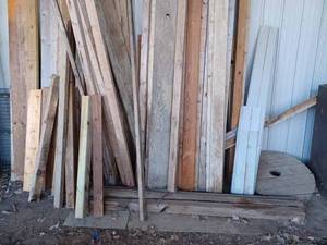lot 133 image: Used Lumber in three Sheds, all for one money, 2 x 4s, 2 X 6s, 2 X 8s, 4 X 4s, Spool Ends, Partial Sheets of Plywood and Chipboard