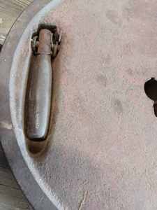 lot 145 image: Cast Iron Flywheel for an International Gas Engine, 3554 DA is Stamped on inside, 14-inch outside Diameter, fits a 1-inch Shaft