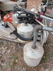 lot 176 image: Pallet of Pontoon Trim, Johnson Mile Master Tank, Homelite Thrifty Mate Tank, Assorted Plastic Test Tanks, Mercury Outboard Trim