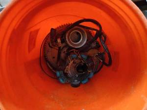 lot 191 image: Marine Steering Wheels, MarineDeck Carpet Pieces, Pails of Bearings and other Parts, Inboard Parts, Mercruiser Valve Covers and More