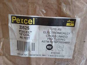 lot 197 image: Three New Rolls of Tubing Partial Roll of Pexcel 12-inch Coil of Pex Tubing, New 200-foot Roll of 12-inch Flex Plus Blue Tubing