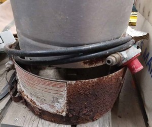 lot 205 image: Propane Heater and a Kerosun Type Parlor Heater