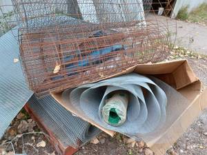 lot 232 image: Pallet with a Partial Roll of New Barbed Wire and Assorted Rolls and Partial Rolls of Garden Wire and Chicken Wire