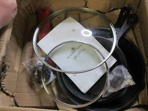 2 megachef cast iron pans with lids...