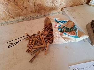 lot 358 image: Vintage Wood Clothes Pins and Cloth Bag