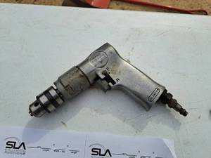 lot 334 image: Central Pneumatic Air Drill