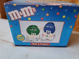 lot 404 image: M&Ms Salt & Pepper Shaker Set (in original packaging)
