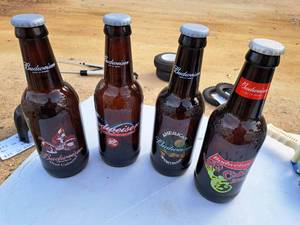 lot 449 image: Lot of (4) 14-12 Budweiser Glass Bottles