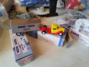lot 474 image: Lot of (3) Ertl Collectbles 143 Scale McKee Baking Company Die-cast Metal Diamond Reo Semi Tractor Trailer (in original packaging)