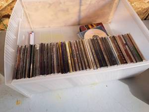 lot 593 image: Lot of (12 Drawer) Music CDs - U2, Celine Dion, Dakota Road Music, John Tesh, Radiohead, Man Against Machine and much more
